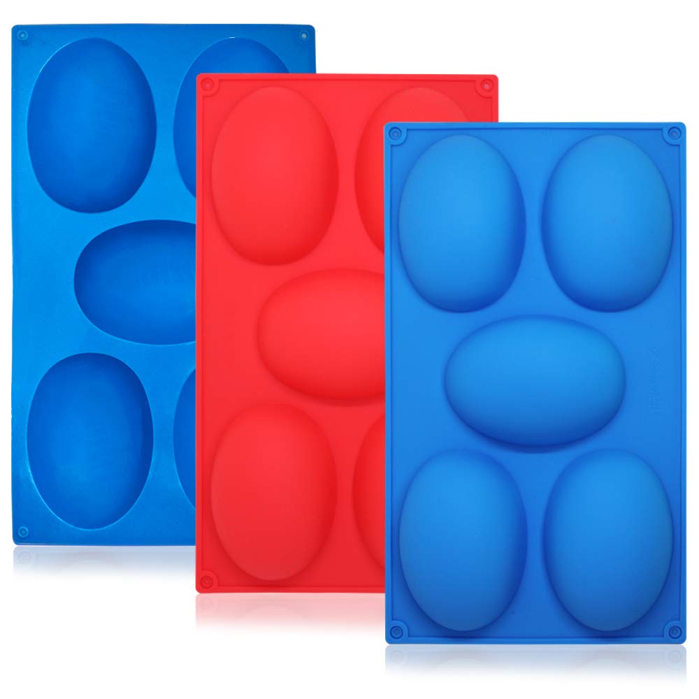 Three silicone moulds designed to shape eggs, featuring a blue mould on the left, a red mould in the center, and another blue mould on the right. Each mould has six oval cavities arranged in two rows. The moulds are flexible, made from silicone, and are suitable for baking or freezing.