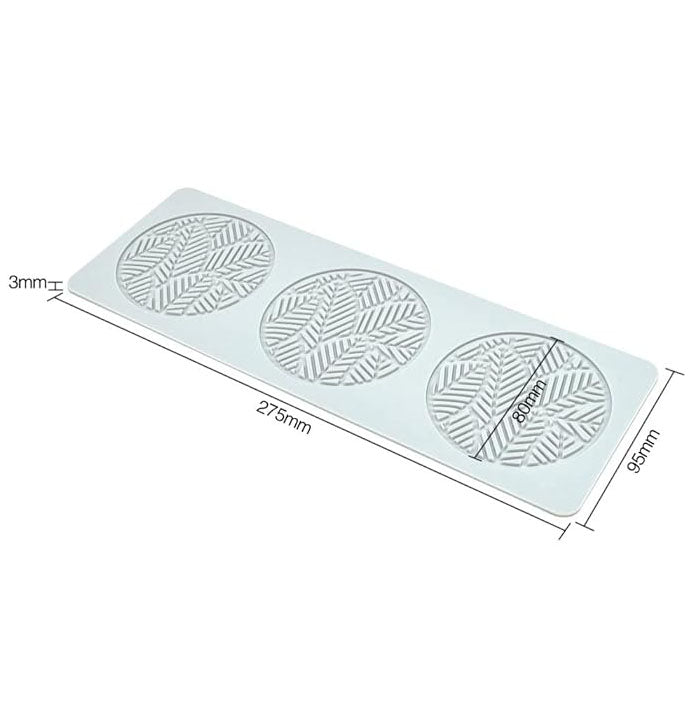 An image of a silicone mold designed to create hollow tree leaf shapes. The mold features three round cavities, each displaying intricate leaf patterns. The dimensions of the mold are labeled: 275 mm in length, 95 mm in width, and 3 mm in height. The mold is a flexible, light-colored silicone material.