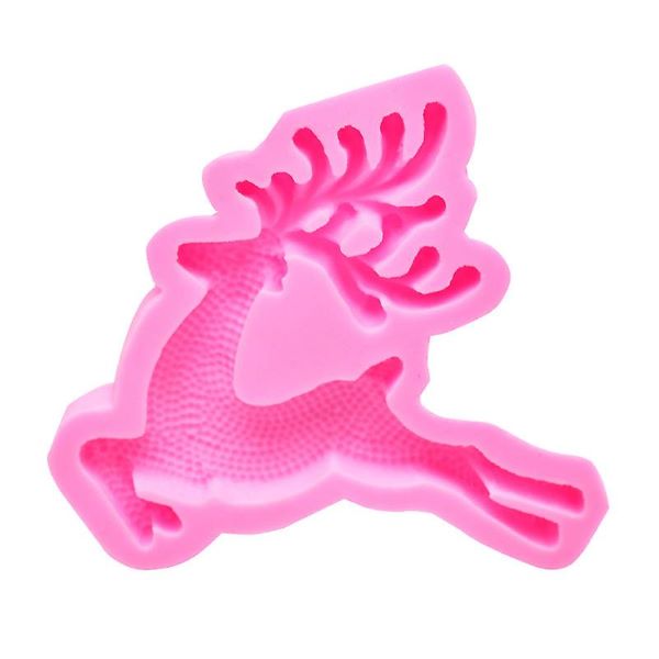 A pink silicone mould shaped like a 3D reindeer. The mould features detailed antlers and textured fur patterns, showing the reindeer in a leaping position.