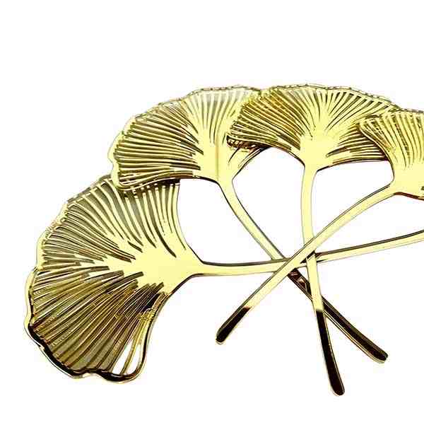 A set of three acrylic cake toppers shaped like ginkgo leaves, featuring a shiny gold finish. The leaves are intricately designed with detailed vein patterns and are arranged in a way that suggests they can be placed on a cake for decoration.