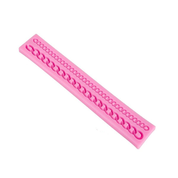 A pink silicone mold in the shape of a chain pattern. The mold is rectangular and features a design that includes interlocking chain links along its length. The surface is smooth, and the mold is flexible, ideal for crafting or creating resin shapes.