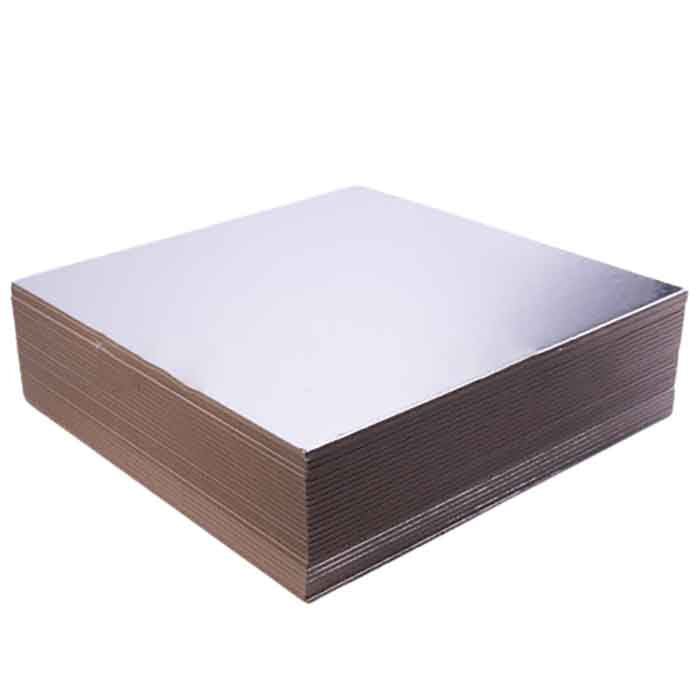 A square cake board with a shiny silver surface. The board is 2mm thick and consists of multiple layers, showcasing a clean and smooth appearance. The edges reveal a slightly textured brown layer underneath.