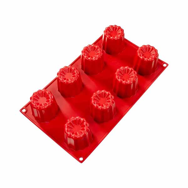 A red silicone cake mold with eight circular cavities, designed in the shape of canelé, featuring a fluted top. The mold has holes for hanging at the corners.