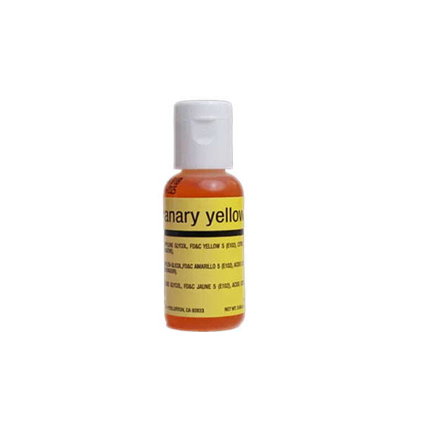 A small bottle of Chefmaster airbrush color in &quot;Canary Yellow.&quot; The bottle is orange with a white cap and features a yellow label that includes the product name and details about the contents. The bottle is positioned against a plain white background.