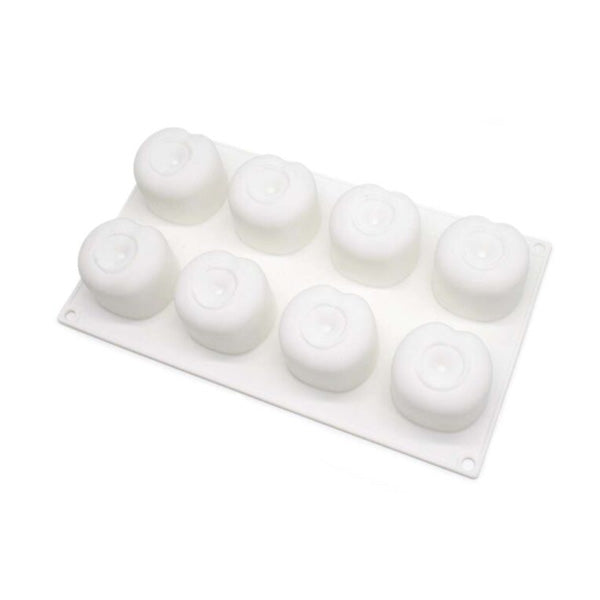 A white silicone mould featuring eight cavities in the shape of cherries, arranged in two rows of four. The mould is flat with rounded tops for each cavity, resembling cherry shapes with a small depression at the center.