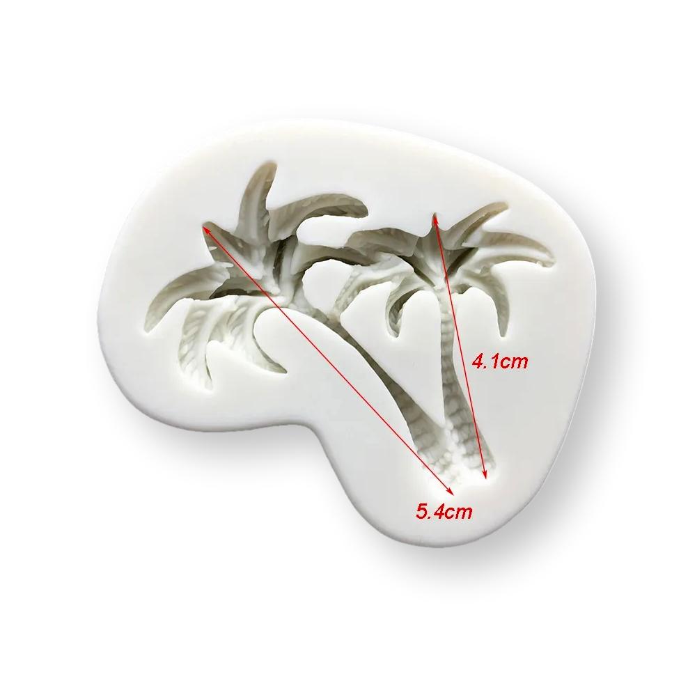 A white silicone mould shaped like a stylized landscape featuring two palm trees. The mould has defined details of the palm trees, including their fronds and trunks. Measurements indicating the heights of the palm trees are marked in red: one is 4.1 cm tall and the other is 5.4 cm tall. The overall shape of the mould is irregular and smooth, suitable for crafting or baking.