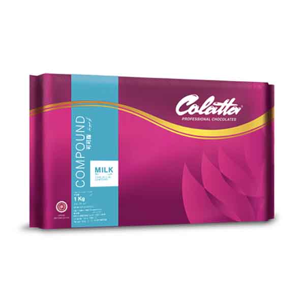 A package of Colatta Milk Chocolate Compound weighing 1 kg. The packaging features a vibrant purple background with a blue section labeled &quot;COMPOUND&quot; and &quot;MILK&quot; in white text. The brand name &quot;Colatta&quot; is prominently displayed at the top in white lettering, accompanied by a gold curve design.