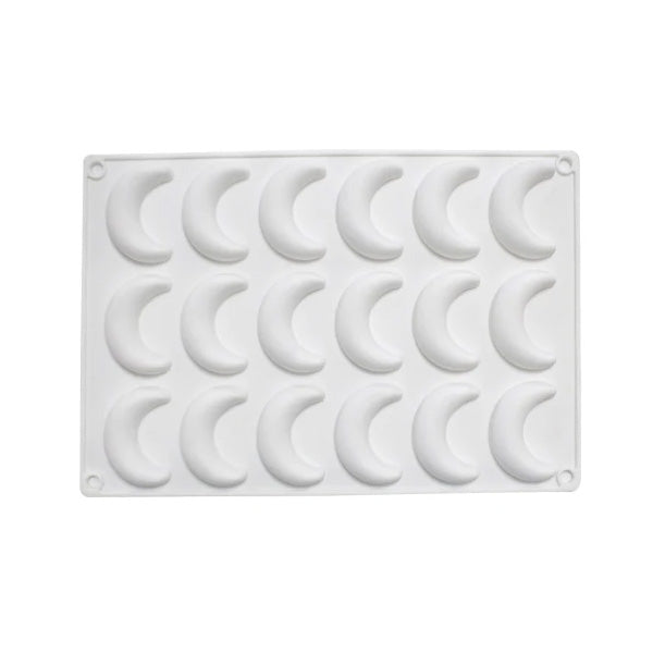 A white silicone mold featuring 18 cavities shaped like crescent moons, arranged in a rectangular grid. The cavities are smooth and rounded, with a simple design suitable for baking or crafting.