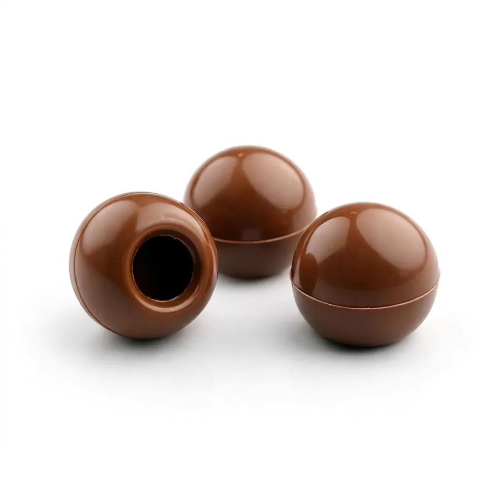 Three brown spherical objects on a white background
