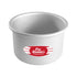 A round, silver baking pan with a smooth finish, featuring a prominent red and white label of &