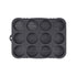 A black muffin pan featuring multiple holes for baking individual muffins or cupcakes.