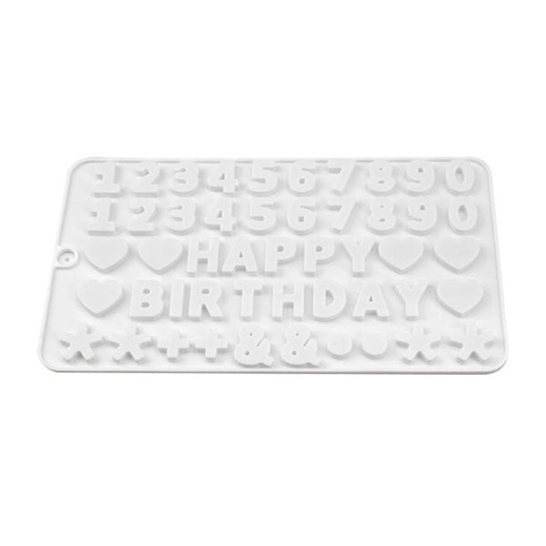 The image shows a rectangular white silicone mold designed for baking or crafting. The mold features various shapes, including the numbers 0 through 9, the words &quot;HAPPY&quot; and &quot;BIRTHDAY&quot; in large block letters, and several decorative symbols such as hearts and stars. The overall design allows for creating mini cakes or decorations with these specific shapes and letters.