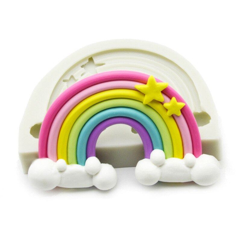 A rainbow-shaped silicone mold featuring colorful layers in pink, yellow, green, blue, and purple representing a rainbow, with white clouds and two yellow stars. The mold is white and showcases an artistic design for crafting.