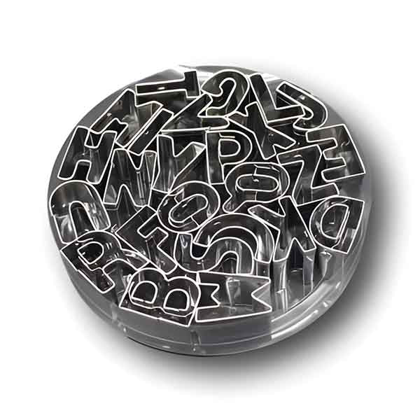 A round container filled with various metal cookie cutters shaped like letters of the alphabet. The letter cutters are arranged closely together, showcasing uppercase letters in a variety of fonts. The container is slightly elevated, offering a clear view of the different shapes. The overall appearance is shiny and metallic, reflecting light.