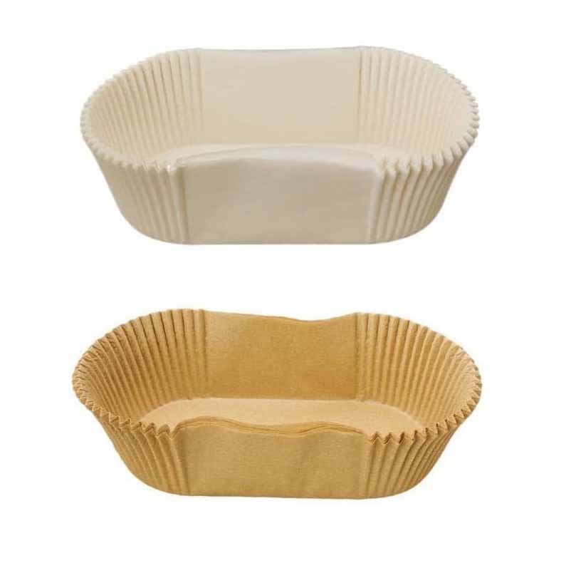 Two disposable paper baking cups displayed together. The cup on the top is white and the cup on the bottom is brown, both with fluted edges. They are oval-shaped and suitable for greaseproof use.