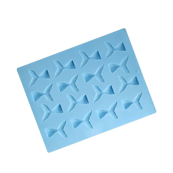 The image features a blue silicone mold designed to create mini mermaid tails. The mold contains multiple cavities, each shaped like a mermaid tail with detailed fins and scales. There are a total of 16 mermaid tail shapes arranged in a grid pattern on a flexible backing. The overall design is playful and ideal for crafting or baking themed treats.
