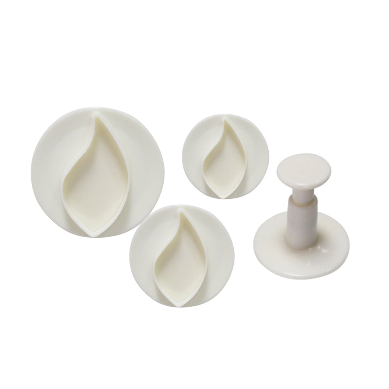 A set of four petal-shaped plunger cutters in white plastic. The set includes three circular cutters of varying sizes, each with a petal shape. To the side, there is a plunger tool designed for use with the cutters.