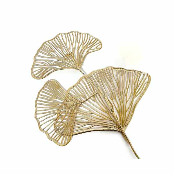 Two decorative ginkgo leaves cake toppers made of plastic, featuring a delicate, intricate design with a shiny gold finish. The leaves are positioned diagonally, with one larger leaf and one smaller leaf, showcasing their detailed vein patterns. The background is white.