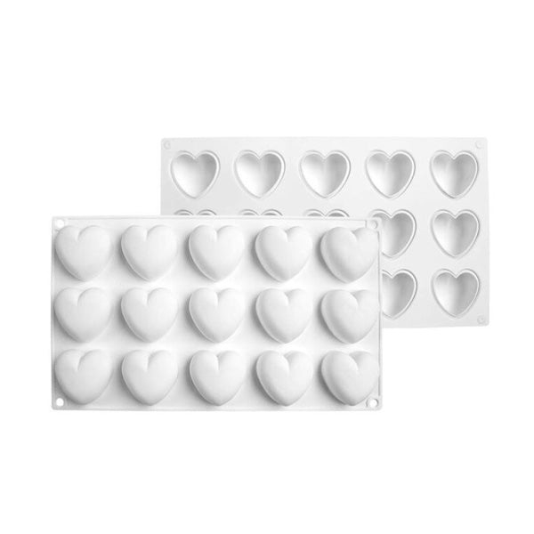 Two silicone moulds are displayed, each shaped like rounded hearts. The front mould features 15 individual cavities shaped like hearts, arranged in a grid pattern. The back mould shows matching cavities, designed to create heart-shaped items. Both moulds are white in color and made of flexible silicone, suitable for baking or crafting.