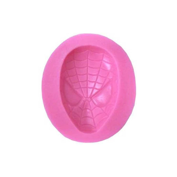 A pink silicone mold shaped like a Spider-Man face, featuring detailed web patterns and facial features. The mold is oval in shape and has a raised design of Spider-Man&