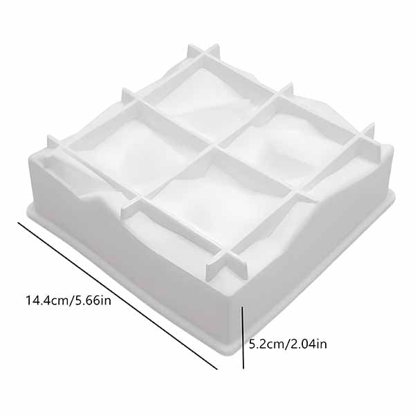 A square, white silicone cake mold with a divided interior to create geometric shapes. The mold has six sections, with a slightly textured surface. Dimensions are indicated: 14.4 cm (5.66 inches) in length and 5.2 cm (2.04 inches) in height.