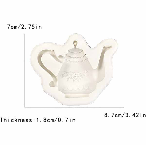 A silicone mold shaped like a teapot, featuring intricate details. The dimensions of the mold are shown: 7 cm (2.75 in) in height, 8.7 cm (3.42 in) in width, and a thickness of 1.8 cm (0.7 in). The mold is in a light color, emphasizing its design.