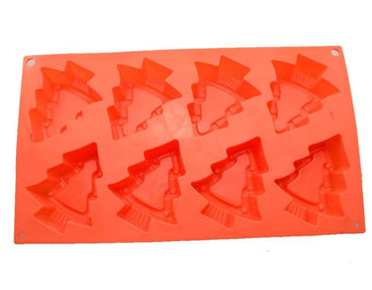 A bright orange silicone mould featuring eight tree-shaped cavities. Each cavity is designed to resemble a Christmas tree, complete with a detailed base and branches. The mould has holes for hanging and is flexible for easy removal of the finished product.