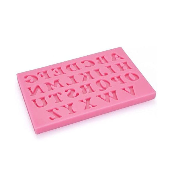 A pink silicone mould featuring uppercase alphabet letters arranged in rows. The letters A to Z are visible, with each letter recessed into the mould for easy casting in various materials. The mould has a rectangular shape with a smooth surface.