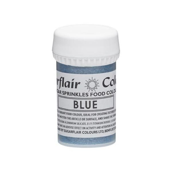 A small, cylindrical container of blue sugar sprinkles is displayed. The container has a white screw-top lid and a label featuring the brand name &quot;Sugarflair&quot; along with the product description &quot;Sugar Sprinkles Food Colour&quot; and the color &quot;BLUE.&quot; The label includes additional text indicating the product&