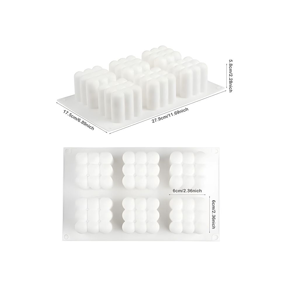 White silicone mold with measurements on a white background