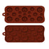 Two silicone button mould trays stacked on top of each other. Each tray has various sizes of button-shaped cavities in a reddish-brown color, with impressions of button holes on each cavity. The moulds have a smooth surface and rounded edges, with a small handle on the side for easy handling.