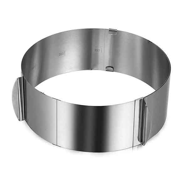 An adjustable round cake ring made of stainless steel. The ring is cylindrical in shape with a smooth surface and is designed to be adjustable in size. It has measurement markings on the inside for easy size adjustments. There are two clips on the side for securing the ring in place. The overall appearance is shiny and metallic, suitable for baking and cake decorating.