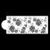 The image features a cake stencil, labeled "Cake Stencil ST 5474." The stencil is white and has a decorative design consisting of various floral patterns. The flowers and leaves are cut out, creating a lace-like effect that allows for decoration when used with icing or dusting powders. The stencil includes a rounded cutout on the left side for easy handling. The background is black, emphasizing the intricate floral design of the stencil.