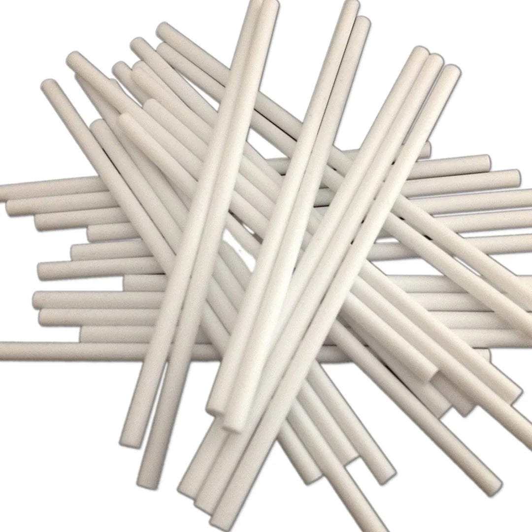 Stack of white straws on a white background