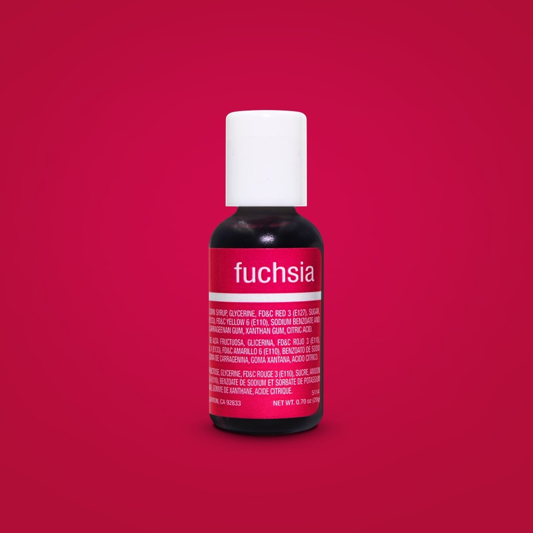 A bottle of Chefmaster Liqua Gel Food Color in fuchsia, 0.7 oz (20 ml). The bottle has a white cap and a bright red label displaying the word "fuchsia" prominently, along with ingredient information and usage instructions. The background is a solid red color.