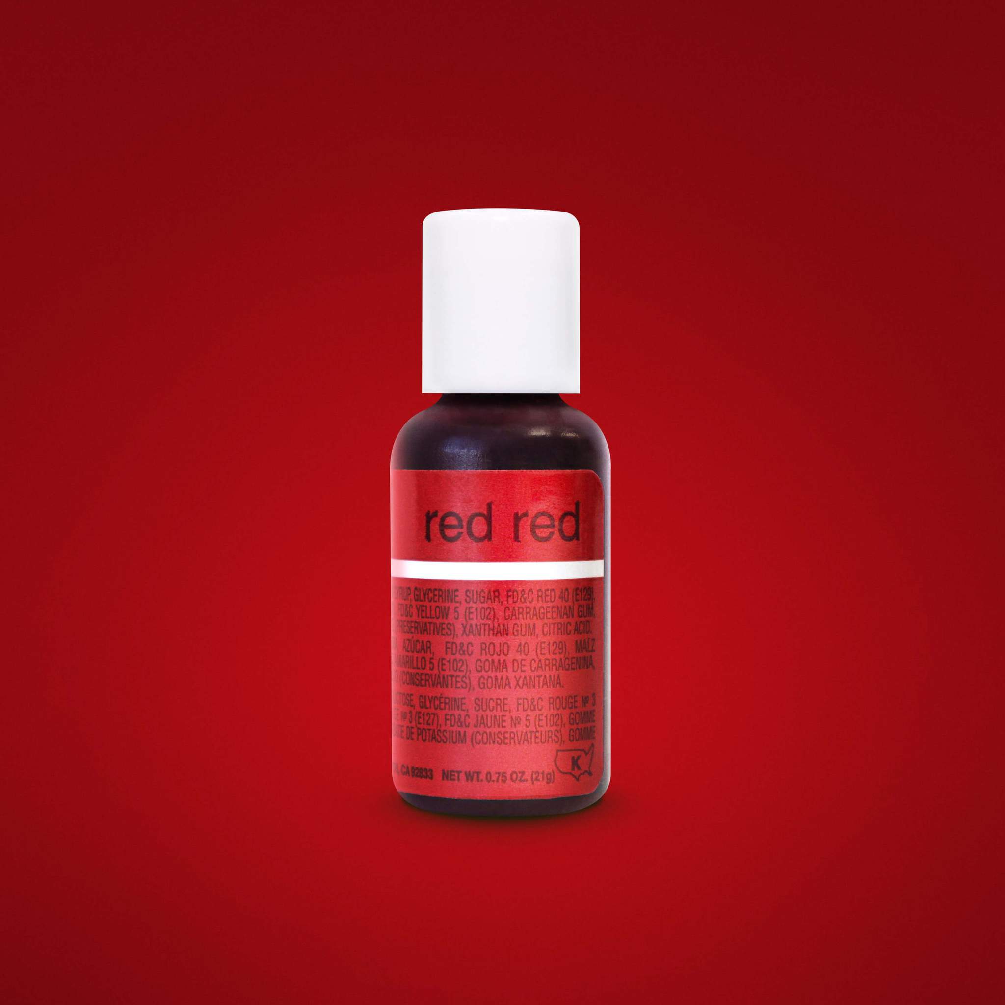 A small bottle of Chefmaster Liqua Gel Color in "Red Red" is displayed against a red background. The bottle is dark with a white screw-on cap. The label features the words "red red" prominently on a red section, along with ingredient information in a smaller font below. The bottle contains 0.75 ounces (21 grams) of product.