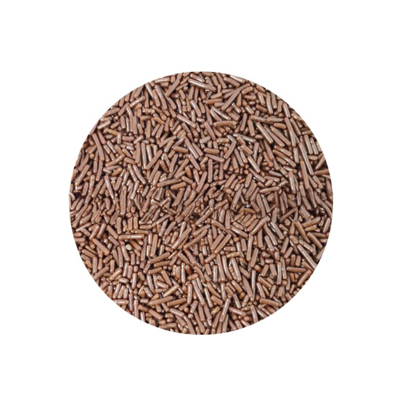 Close-up of a circular pile of chocolate sprinkles on a white background. The sprinkles are small, cylindrical, and dark brown, suggesting a sweet, indulgent treat.