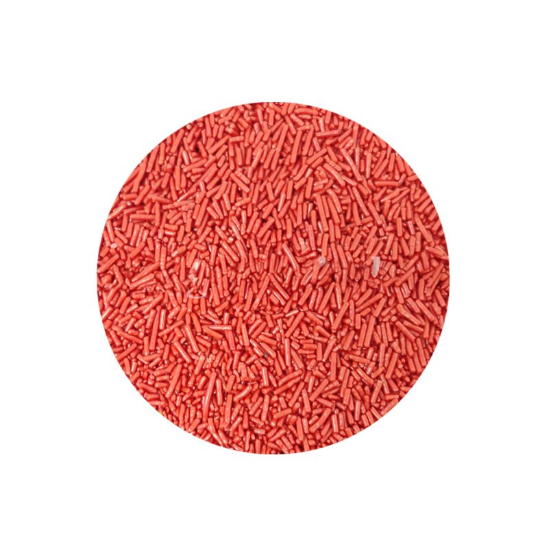 A round pile of pink sprinkles is centered on a white background. The sprinkles are uniform in size, creating a textured, vibrant appearance.