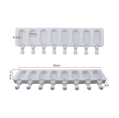 Two white silicone ice pop molds shown from the front and side. Each mold accommodates eight popsicles. Dimensions are labeled in centimeters.