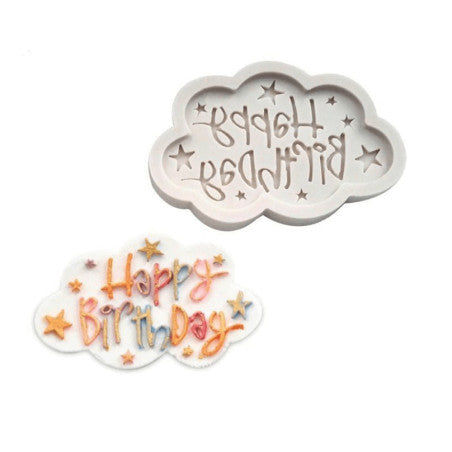 The image features a silicone mould designed in the shape of a cloud. The mould includes the text "Happy Birthday" in a decorative font, surrounded by small stars. Below the mould, there is a completed cake decoration made from the mould, which displays the words "Happy Birthday" in colorful icing with a similar cloud shape and star accents. The overall design is whimsical and suitable for birthday celebrations.