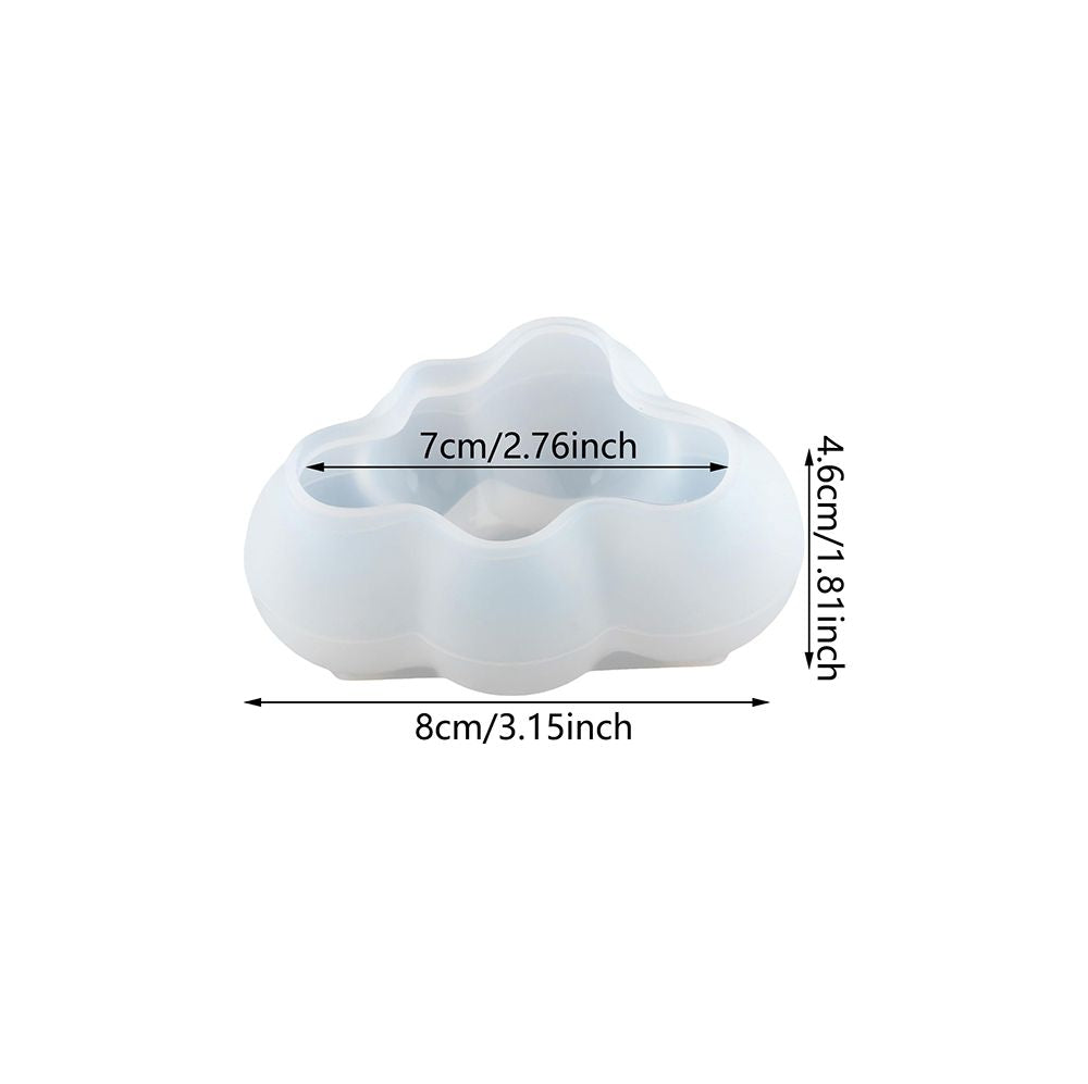 White cloud-shaped object with measurements on a white background
