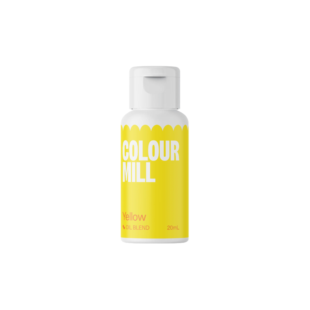 A bottle of Colour Mill oil-based food color in yellow, 20ml. The bottle has a sleek design with a white cap. The main body of the bottle is bright yellow, featuring bold white text that reads "COLOUR MILL" at the top and "Yellow" along with "OIL BLEND" and "20mL" towards the bottom. The design includes a scalloped edge pattern at the top. The background is plain black, making the product stand out prominently.