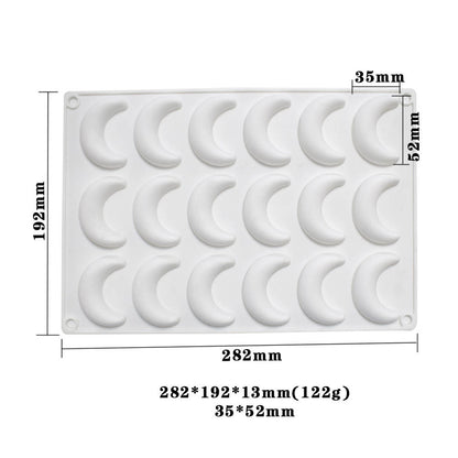 The image shows a white silicone mold featuring 18 crescent moon shapes. The mold is rectangular and measures 282mm in width and 192mm in height. Each crescent moon cavity is approximately 35mm wide and 52mm tall. The mold is flexible and designed for baking or crafting purposes. Measurements and cavity details are displayed on the side of the mold for reference.