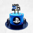 A two-tiered blue cake with a black base. The top is adorned with a black acrylic topper that reads "LEVEL 25th UNLOCKED" in bold letters, alongside a video game controller graphic. The cake features colorful shapes and a PlayStation logo on the front, with small black spikes around the base.