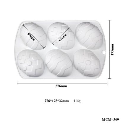 A white silicone mold designed for shaping eggs, featuring six oval cavities with various textured patterns. The mold dimensions are marked: 276mm in width and 175mm in height, with each egg-shaped cavity measuring 90mm and 67mm. The thickness of the mold is 32mm, and it weighs 114g.