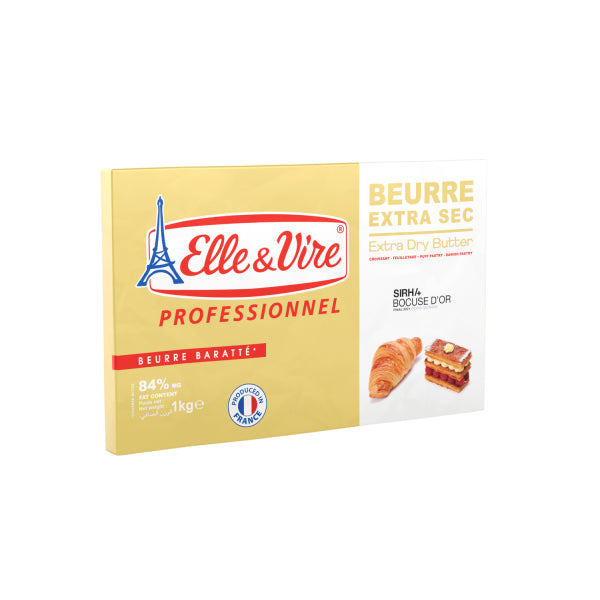 A 1kg box of Elle &amp; Vire Extra Dry Butter with a yellow design, red and blue text. Features a croissant and patisserie image to convey gourmet quality.