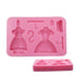 A pink silicone mold designed for creating miniature girl dress and hanger shapes. The main mold features two dress designs, a hanger, a hook, and a small round accessory. A smaller, separate molded piece showing one dress shape is positioned in front of the main mold.