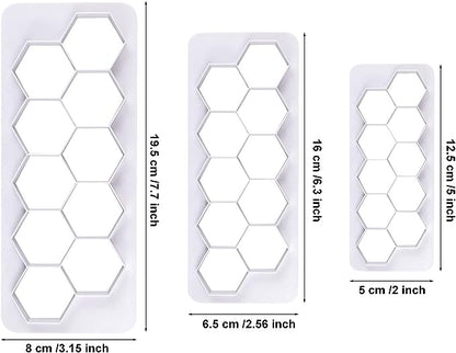 A product image displaying a set of three hexagon cookie cutters of varying sizes, each shown in a vertical layout. The largest cutter measures 19.5 cm (7.7 inches) by 8 cm (3.15 inches), the medium cutter is 16 cm (6.3 inches) by 6.5 cm (2.56 inches), and the smallest cutter is 12.5 cm (5 inches) by 5 cm (2 inches). Each cutter features a series of hexagonal shapes, outlined in white against a transparent background.