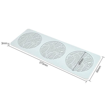 An image of a silicone mold designed to create hollow tree leaf shapes. The mold features three round cavities, each displaying intricate leaf patterns. The dimensions of the mold are labeled: 275 mm in length, 95 mm in width, and 3 mm in height. The mold is a flexible, light-colored silicone material.