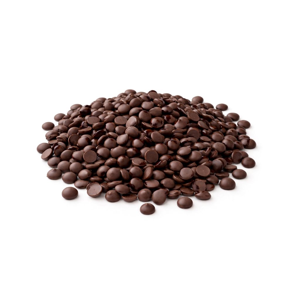 A scattered pile of chocolate chips on a plain white background, emphasizing their shiny appearance and tempting allure.